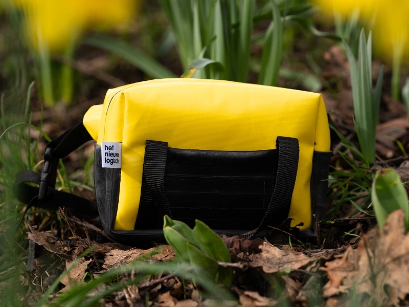 Bags made from recycled tarpaulin and tire tubes by Het Nieuwe Logisch | Waste Alchemists
