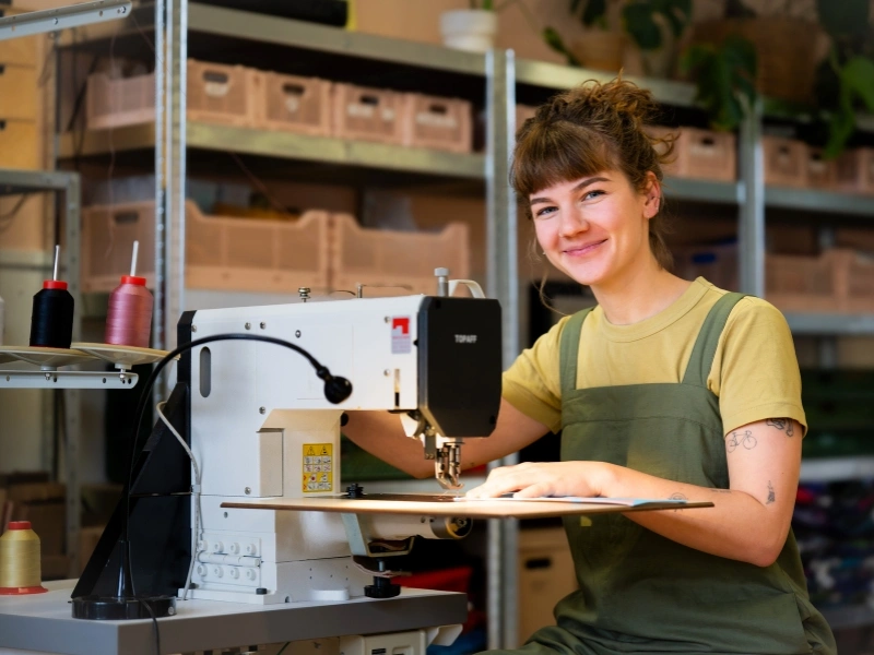 Studio Fiep using a community funded industrial sewing machine | Waste Alchemist