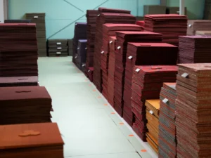 Piles of carpet tile waste - Studio Wae - Waste Alchemists